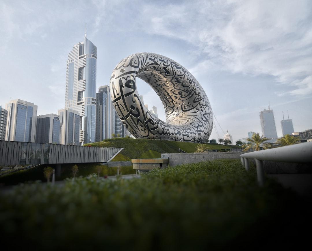 a large sculpture in the middle of a city — Photo by Riyas Mohammed on Unsplash