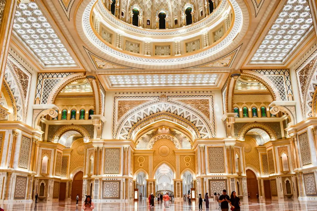 A large building with a domed ceiling and a chandelier — Photo by Alex on Unsplash