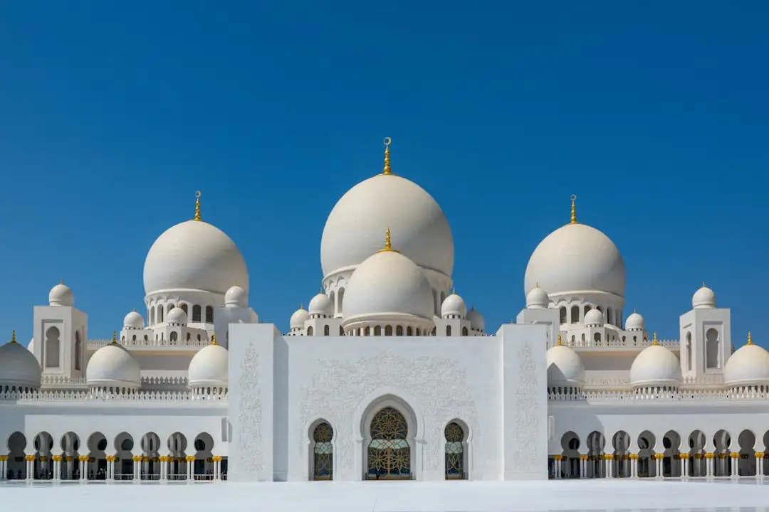white and brown dome building under blue sky during daytime — Photo by Nick Fewings on Unsplash