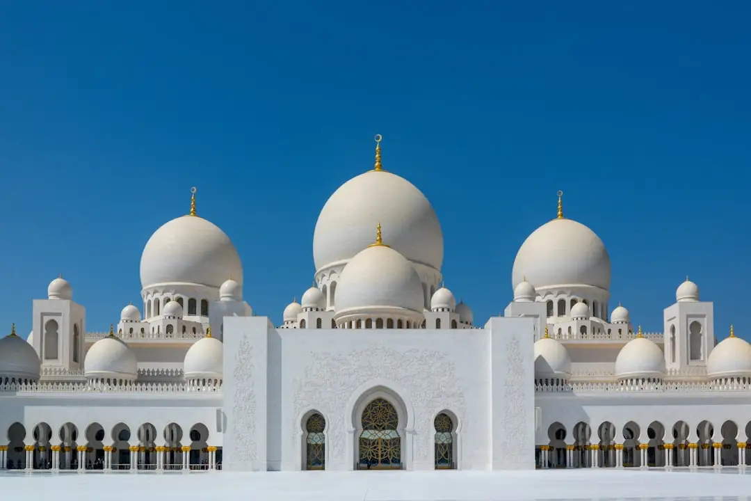 white and brown dome building under blue sky during daytime — Photo by Nick Fewings on Unsplash
