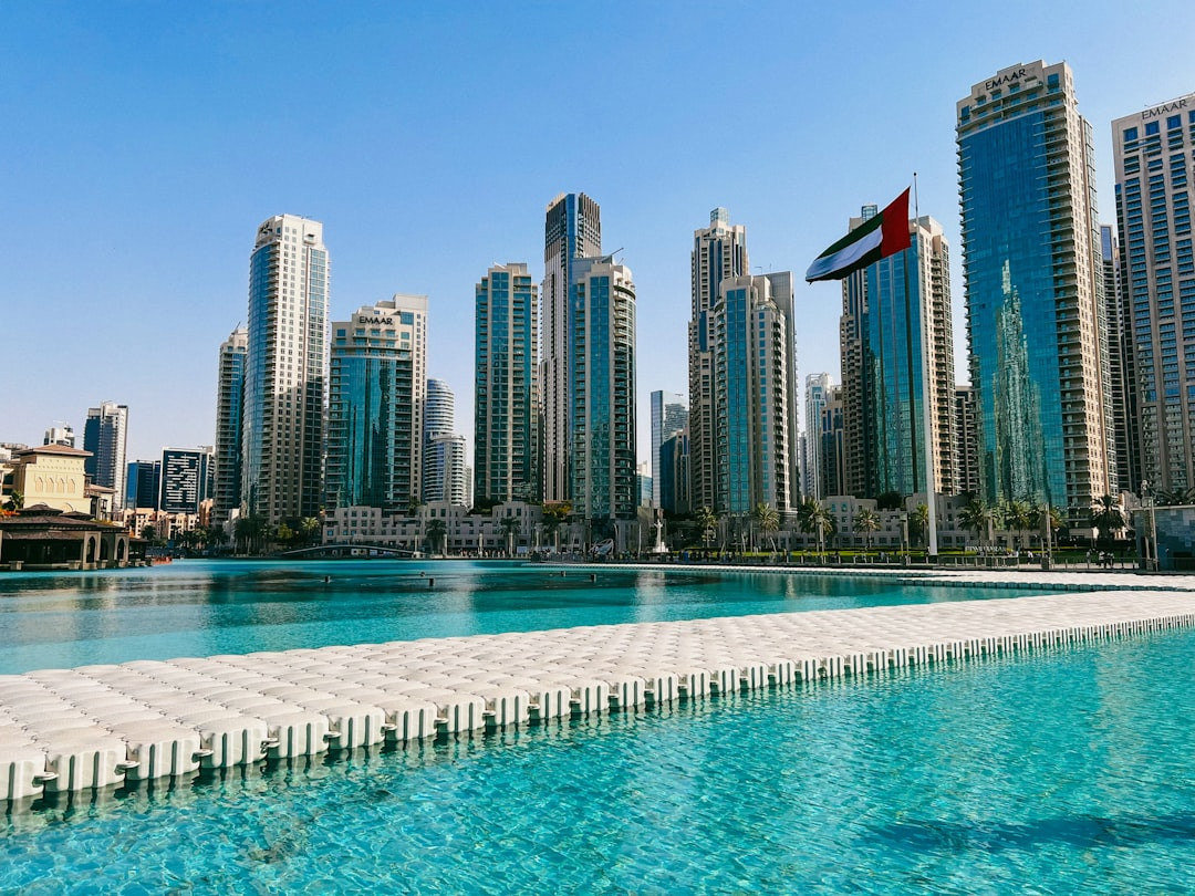 A large body of water with a city in the background — Photo by Vishnu Kalanad on Unsplash