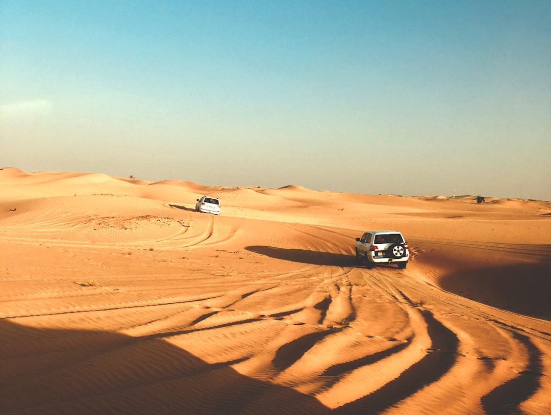 photo of gray vehicle on desert — Photo by Jakub David on Unsplash
