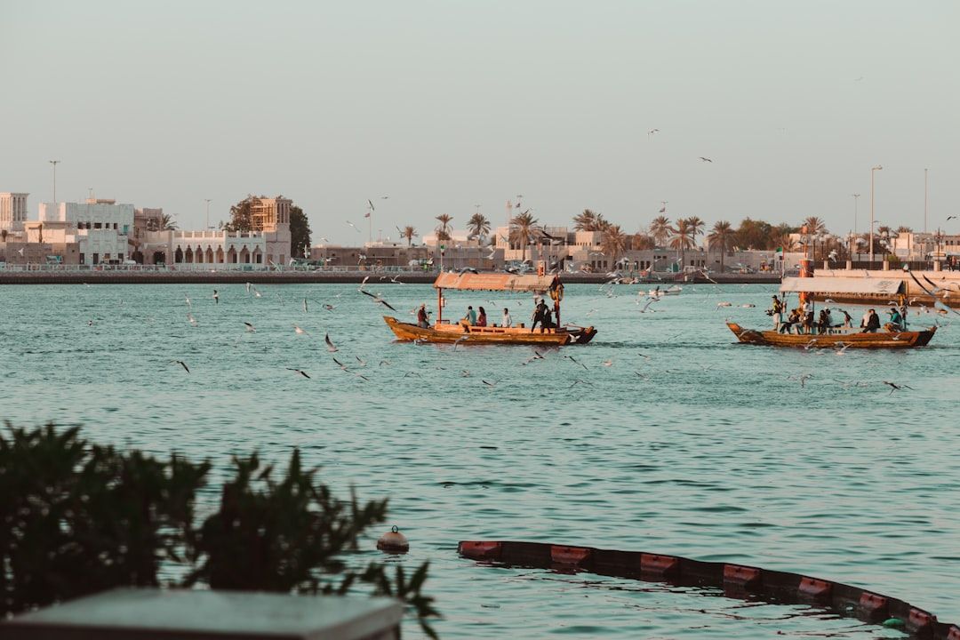 people on boat near buildings at daytime — Photo by Emilie Farris on Unsplash
