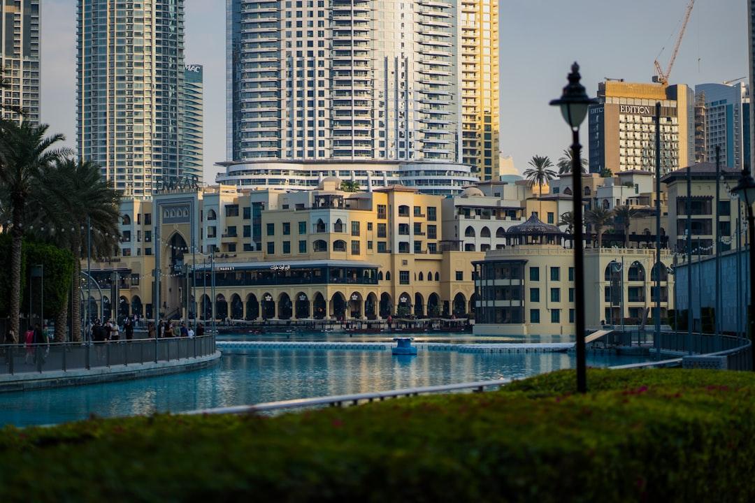 A view of a city with tall buildings in the background — Photo by Usman Yousaf on Unsplash