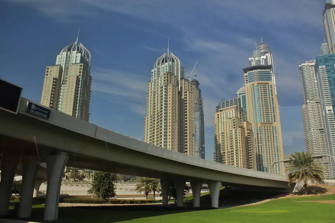 white and brown concrete buildings under blue sky during daytime — Photo by Ajit Sandhu on Unsplash
