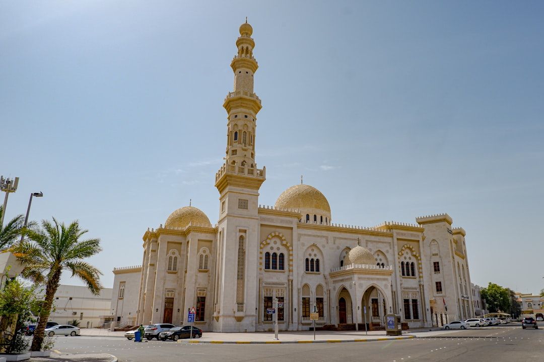 a large white building with a gold domed roof — Photo by Lucas Hemingway on Unsplash