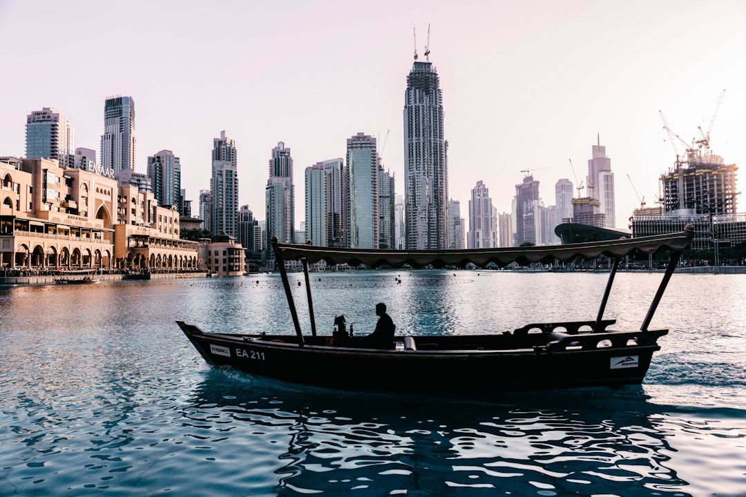 person riding boat — Photo by Philipp Katzenberger on Unsplash