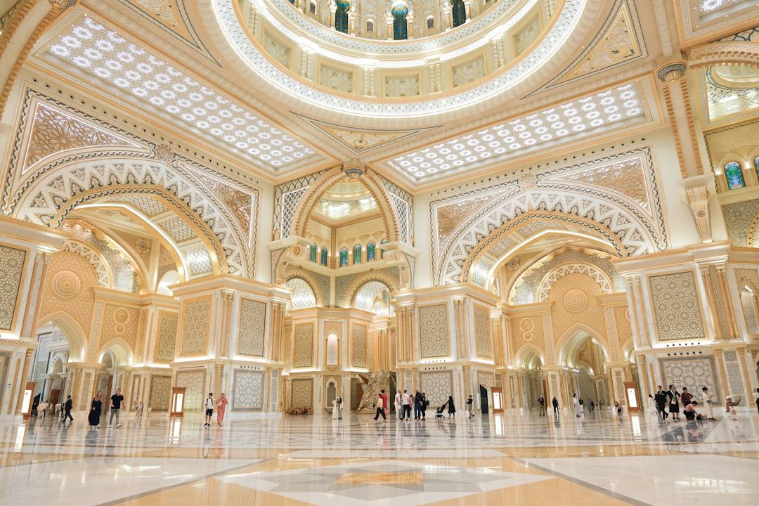 An ornate palace interior with high ceilings. — Photo by Mary Rose Relente on Unsplash