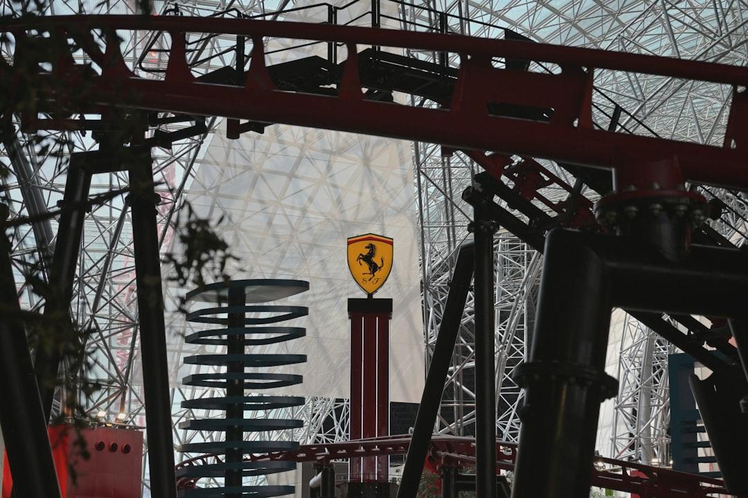 Ferrari logo on a roller coaster structure — Photo by Po-Hsuan Huang on Unsplash