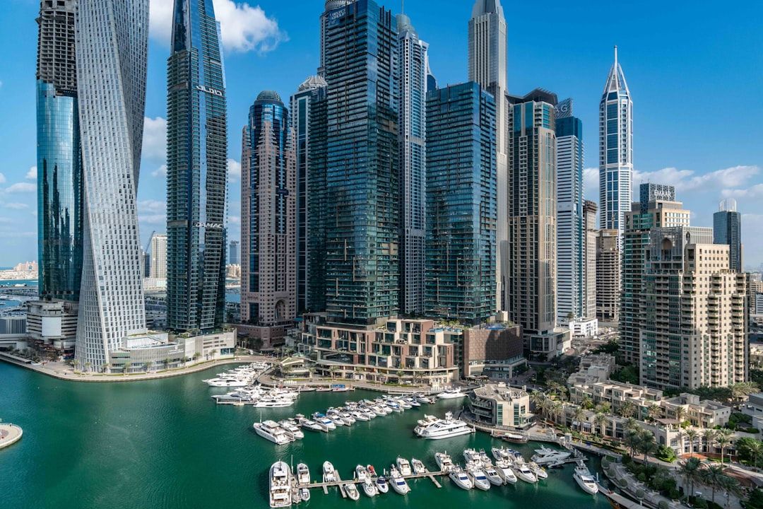 A view of a city with a lot of tall buildings — Photo by Nelemson Guevarra on Unsplash