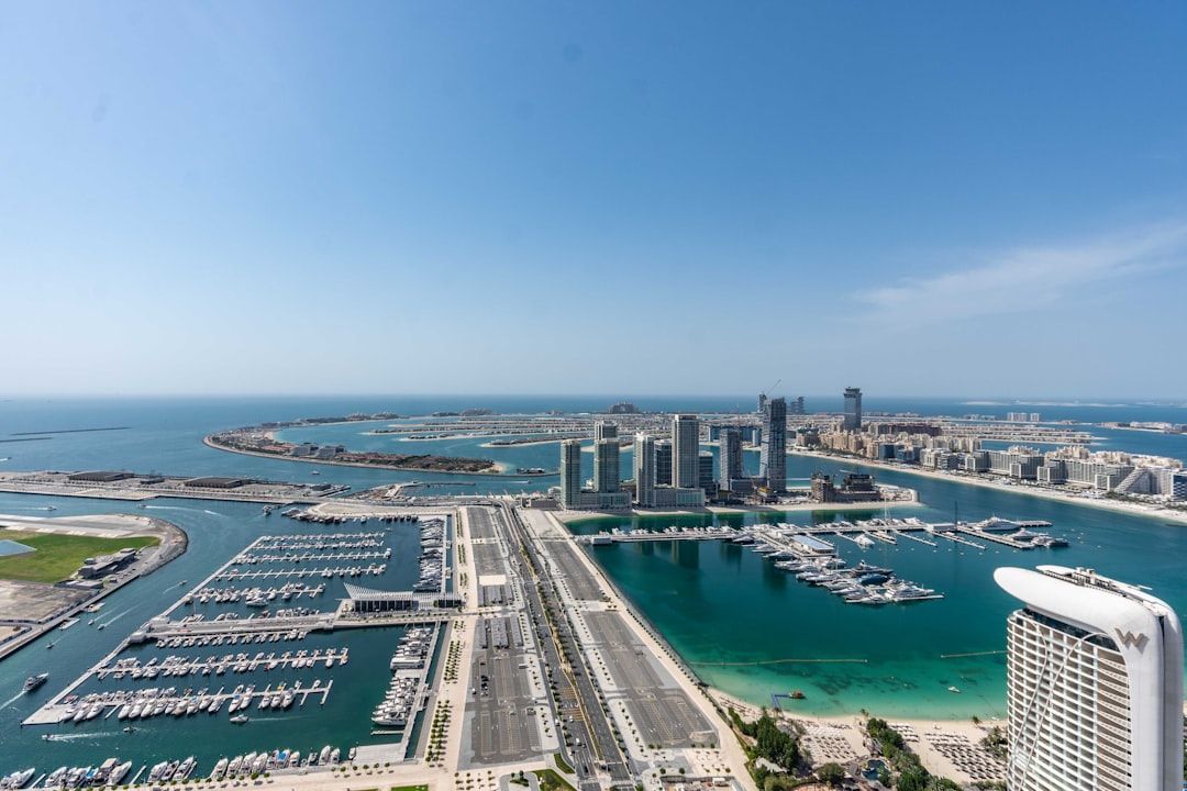 An aerial view of a city and a harbor — Photo by Nelemson Guevarra on Unsplash